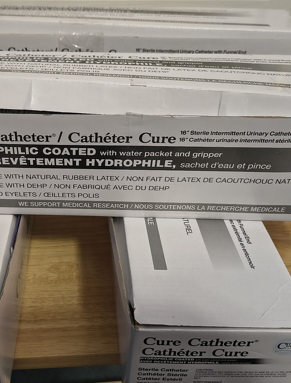 Cure Catheters 16" HM14C, 14 Fr. COUDE TIP W/FUNNEL END. NEW...$25 each